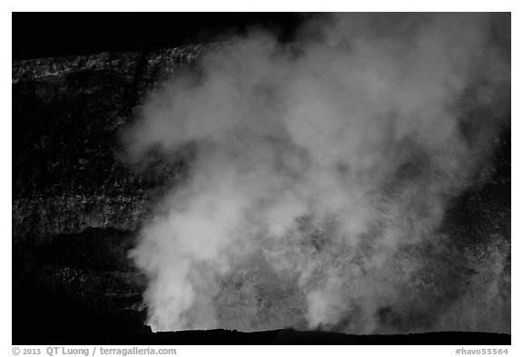 Halemaumau plume and crater walls lit by lava lake. Hawaii Volcanoes National Park, Hawaii, USA.