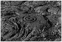 Petroglyph with motif of concentric circles. Hawaii Volcanoes National Park, Hawaii, USA. (black and white)