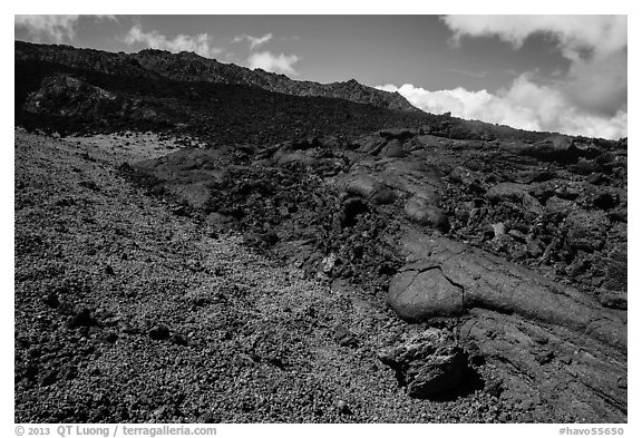 Olivine crystals, red lava rock, and lava fields, Mauna Loa. Hawaii Volcanoes National Park (black and white)