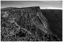 Mauna Kea, summit cliff, and Mokuaweoweo crater from top of Mauna Loa. Hawaii Volcanoes National Park, Hawaii, USA. (black and white)