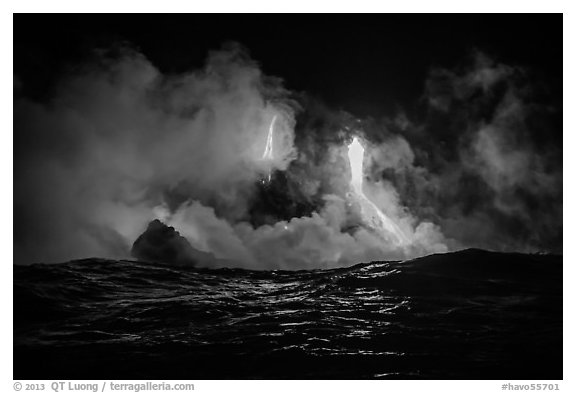 Lava cascades lighting ocean at night. Hawaii Volcanoes National Park (black and white)