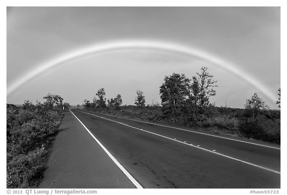 Rainbow over highway. Hawaii Volcanoes National Park, Hawaii, USA.