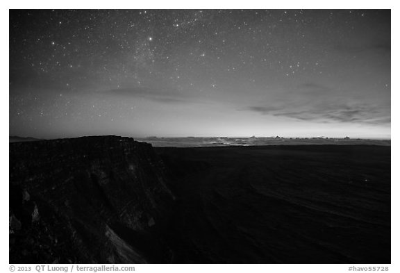 Stars, Mauna Loa summit cliffs, Mokuaweoweo crater, Halemaumau glow at dawn. Hawaii Volcanoes National Park, Hawaii, USA.