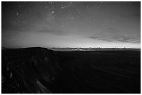 Stars, Mauna Loa summit cliffs, Mokuaweoweo crater, Halemaumau glow at dawn. Hawaii Volcanoes National Park ( black and white)