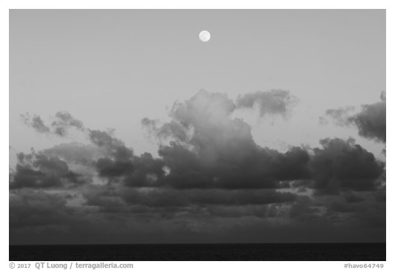 Moon, clouds and ocean, sunset. Hawaii Volcanoes National Park (black and white)