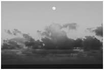 Moon, clouds and ocean, sunset. Hawaii Volcanoes National Park ( black and white)