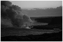 Coastline with ocean entry, sunset. Hawaii Volcanoes National Park ( black and white)