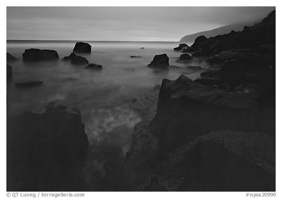 Rocky coastline at dusk, Siu Point, Tau Island. National Park of American Samoa (black and white)