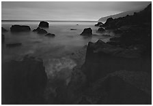 Rocky coastline at dusk, Siu Point, Tau Island. National Park of American Samoa (black and white)