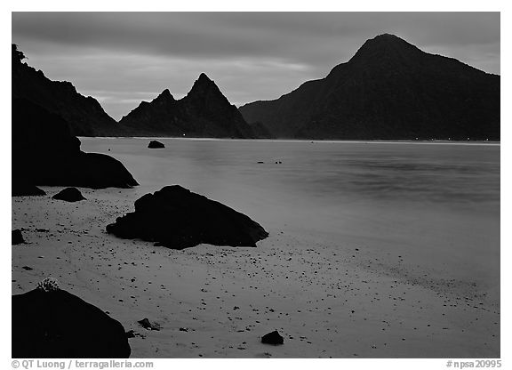 Beach and pointed peaks at dusk, Ofu Island. National Park of American Samoa