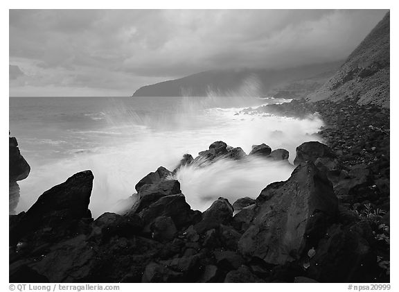 Stormy ocean and balsalt boulders, Siu Point, Tau Island. National Park of American Samoa (black and white)