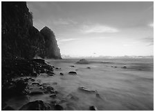 Foamy water and Pola Island at dawn, Tutuila Island. National Park of American Samoa (black and white)