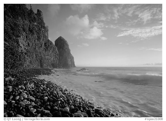 Beach with pebbles and Pola Island, early morning, Tutuila Island. National Park of American Samoa (black and white)