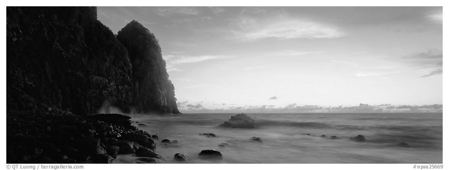 Towering sea cliff at dawn, Tutuila Island. National Park of American Samoa (black and white)