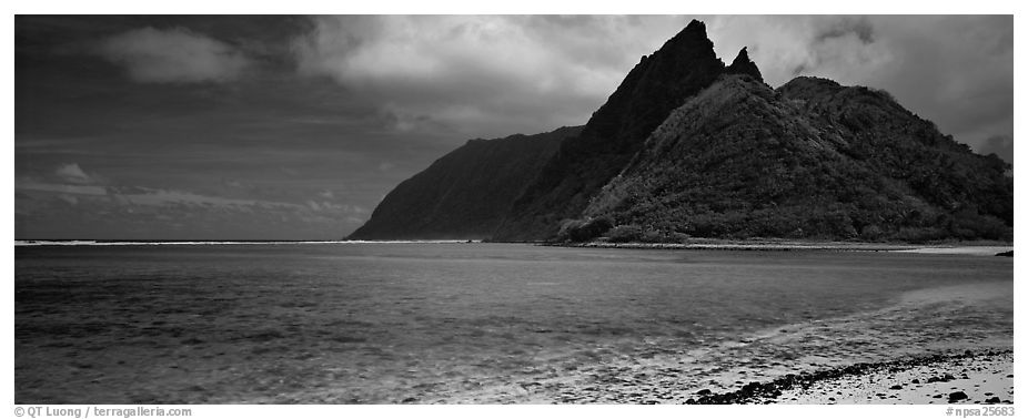 Tropical landscape with blue waters, pointed peaks, and clouds, Ofu Island. National Park of American Samoa (black and white)