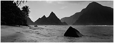 Tropical peaks raising abruptly above beach, Ofu Island. National Park of American Samoa (Panoramic black and white)