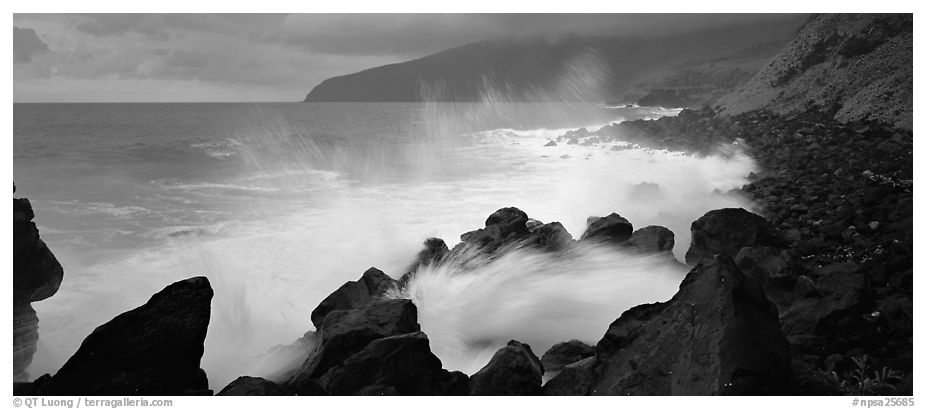 Shoreline with black rock pounded by strong surf, Tau Island. National Park of American Samoa (black and white)