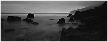 Rugged coastline at dusk. National Park of American Samoa (Panoramic black and white)