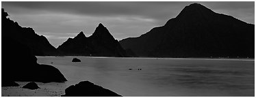 Bay with coastal peaks at dusk. National Park of American Samoa (Panoramic black and white)