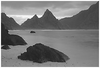 Balsalt boulders on South Beach, Sunuitao Peak in the background, Ofu Island. National Park of American Samoa (black and white)