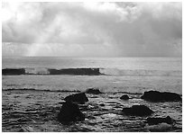 Rainbow and boulders, Siu Point, Tau Island. National Park of American Samoa ( black and white)