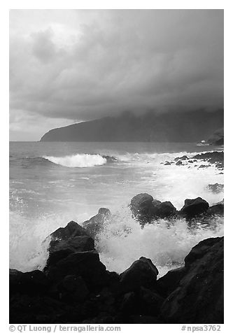 Stormy seascape with crashing waves and clouds, Siu Point, Tau Island. National Park of American Samoa