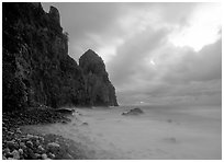 Peeble beach and Pola Island, stormy sunrise, Tutuila Island. National Park of American Samoa (black and white)