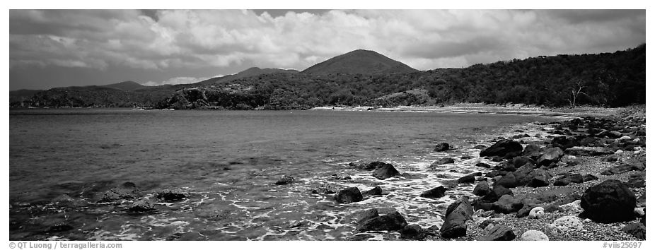 Bay lined with boulders and verdant hills. Virgin Islands National Park (black and white)