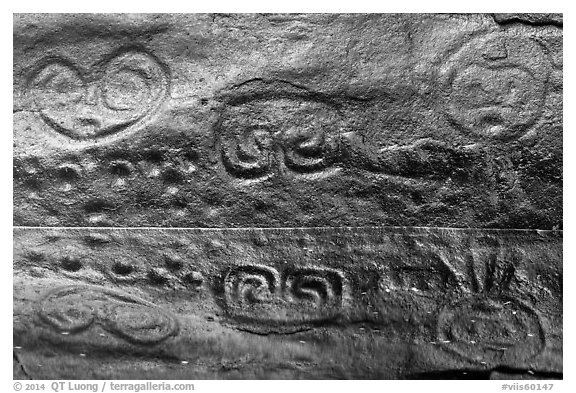 Taino petroglyph carvings reflected in pond. Virgin Islands National Park (black and white)