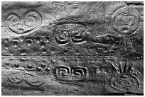 Taino petroglyph carvings reflected in pond. Virgin Islands National Park ( black and white)