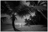 Salomon beach with distant lights at night. Virgin Islands National Park ( black and white)