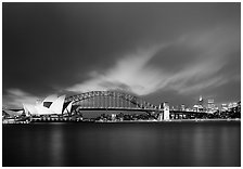 Opera House and Harbor Bridge at night. Sydney, New South Wales, Australia (black and white)