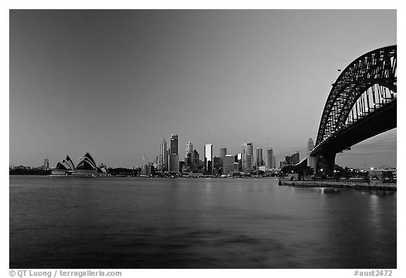 Harbour bridge, city skyline and opera house, dawn. Sydney, New South Wales, Australia (black and white)