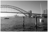 View across Harboor and Harboor bridge, morning. Sydney, New South Wales, Australia ( black and white)