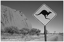 Kangaroo crossing sign near Ayers Rock. Australia (black and white)