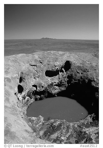 Green pool on Ayers Rock, Olgas in a distance. Uluru-Kata Tjuta National Park, Northern Territories, Australia