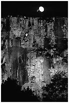 Rock climbing on the banks of the Brisbane River at night. Brisbane, Queensland, Australia (black and white)