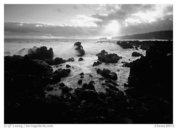 Rocks and surf at sunrise, Keanae Peninsula. Maui, Hawaii, USA (black and white)