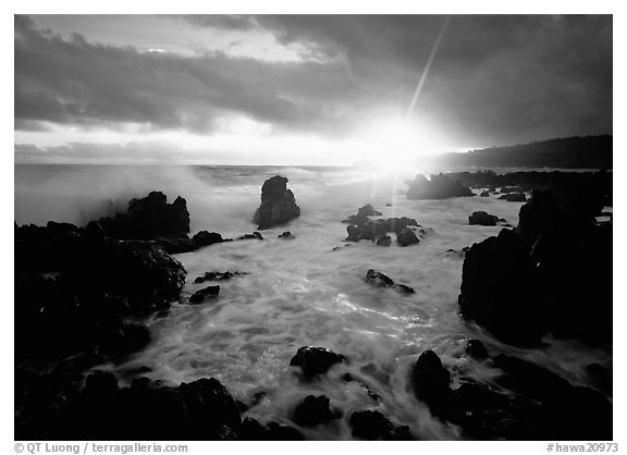 Sun and surf over rugged rocks, Kenae Peninsula. Maui, Hawaii, USA (black and white)