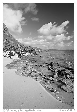 Beach and rocks near Makai research pier,  early morning. Oahu island, Hawaii, USA