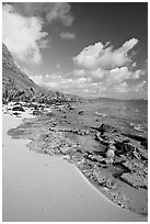 Beach and rocks near Makai research pier,  early morning. Oahu island, Hawaii, USA (black and white)