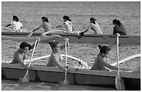 Outriggers canoes during late afternoon practice, Maunalua Bay. Oahu island, Hawaii, USA (black and white)