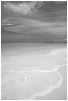 Foam, sand, and turquoise waters, Waimanalo Beach. Oahu island, Hawaii, USA (black and white)