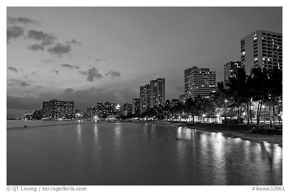 Waterfront and high-rise hotels at dusk. Waikiki, Honolulu, Oahu island, Hawaii, USA (black and white)