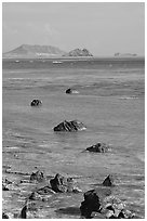 Rocks and turquoise waters near Makai research pier. Oahu island, Hawaii, USA (black and white)