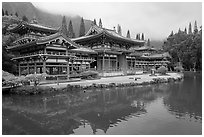 Byodo-In temple reflected in pond on a cloudy day. Oahu island, Hawaii, USA (black and white)