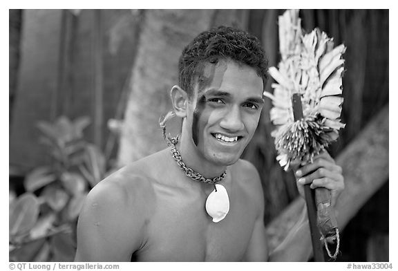 Fiji man with traditional face painting. Polynesian Cultural Center, Oahu island, Hawaii, USA