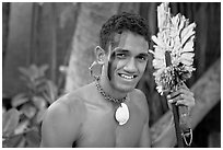 Fiji man with traditional face painting. Polynesian Cultural Center, Oahu island, Hawaii, USA (black and white)