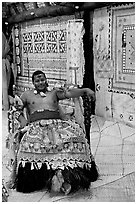 Fiji tribal chief inside vale levu (chief) house. Polynesian Cultural Center, Oahu island, Hawaii, USA ( black and white)