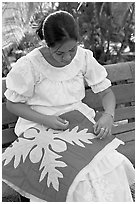 Woman quilting. Polynesian Cultural Center, Oahu island, Hawaii, USA ( black and white)